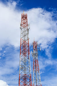 Low angle view of communications tower against sky