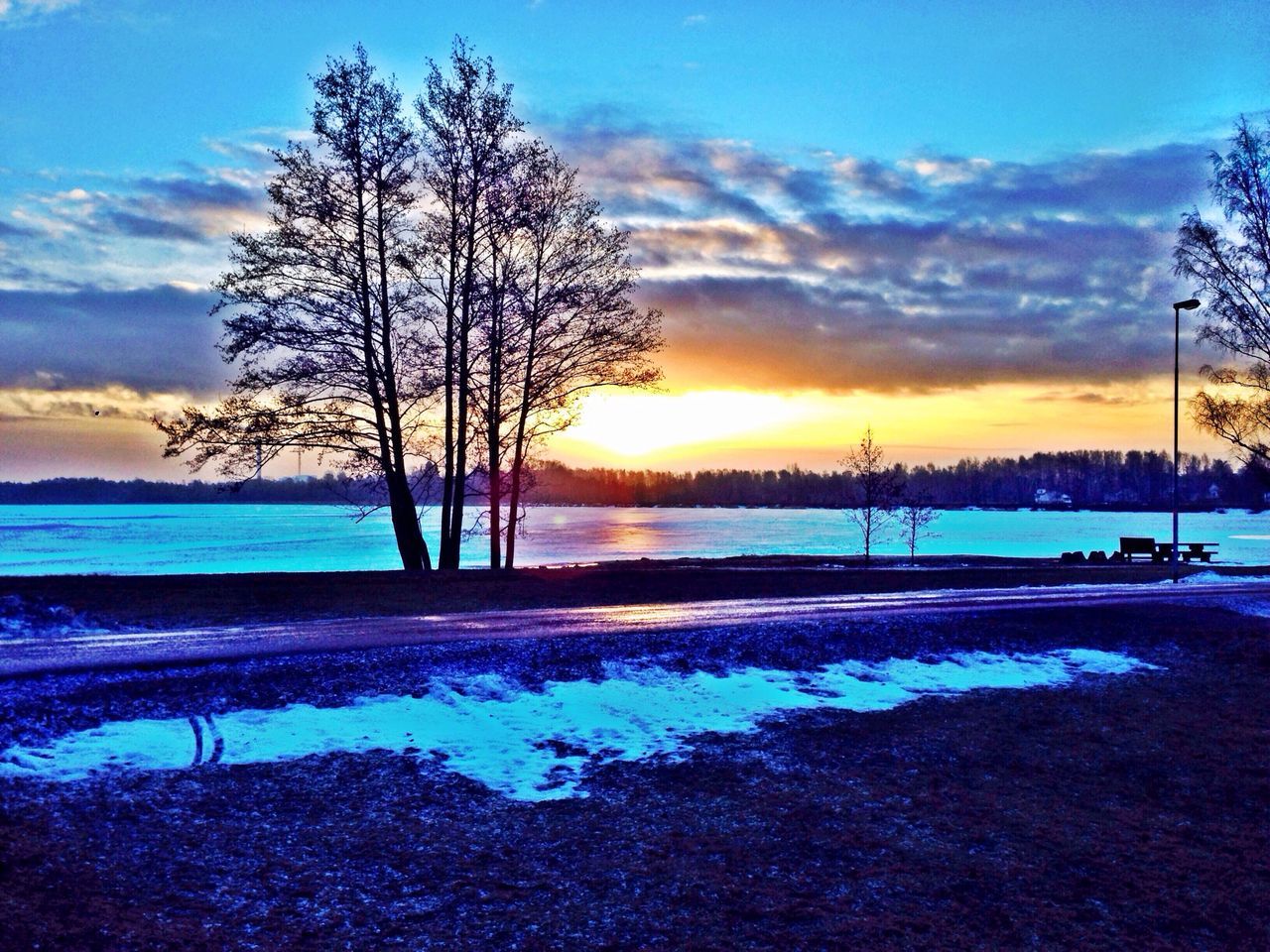 snow, winter, cold temperature, sunset, bare tree, tranquil scene, tranquility, sky, scenics, beauty in nature, season, tree, nature, weather, silhouette, cloud - sky, frozen, landscape, covering, branch