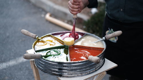 High angle view of man preparing food