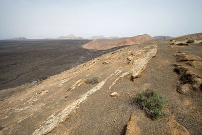 Scenic view of desert against sky