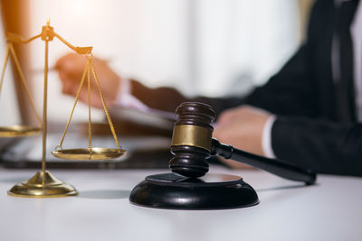 Close-up of clock on table