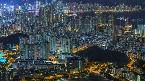 High angle view of illuminated buildings at night