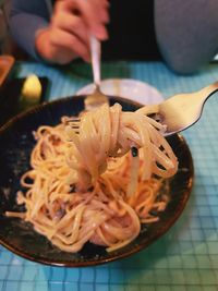 High angle view of person preparing food on table