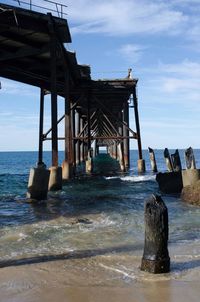 Pier over sea against sky