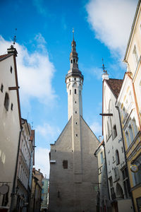 Low angle view of buildings against sky in city