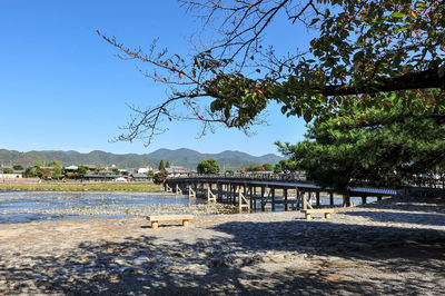 Bridge over river against clear sky