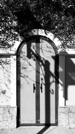 Low angle view of gate against building