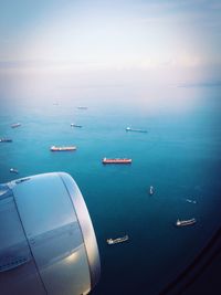 High angle view of airplane on sea against sky