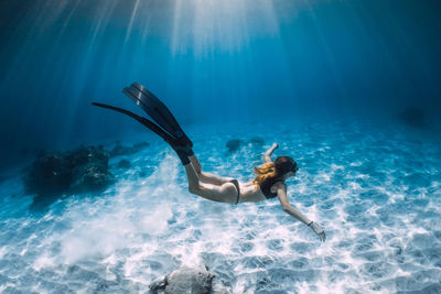 Man swimming in sea