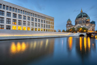 The modern backside of the city palace, the cathedral and the river spree