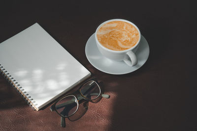 High angle view of coffee on table