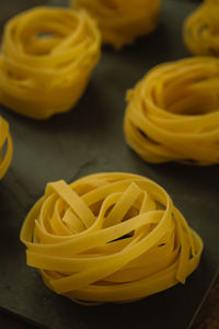 Close-up of yellow rose on table