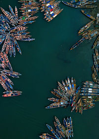 High angle view of canoes at a fishing harbor