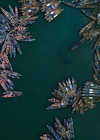 High angle view of ferris wheel at harbor