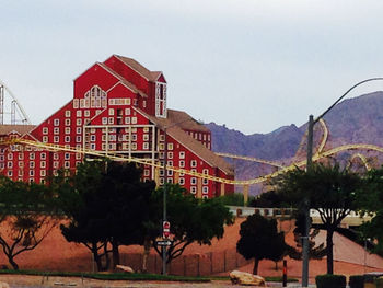 View of buildings against mountain range