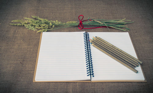 High angle view of open book on table