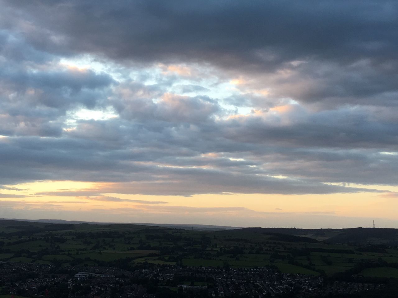 SCENIC VIEW OF SUNSET OVER CITY