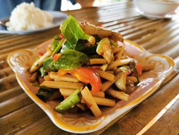 High angle view of chopped vegetables in bowl on table