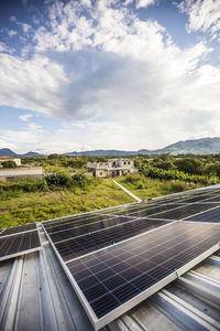 High angle of solar panels on roof of rural building in guatemala.