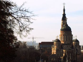 Buildings in city against sky