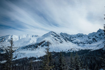 Scenic view of snowcapped mountains against sky