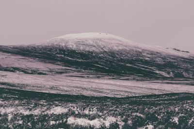 Aerial view of snow covered landscape