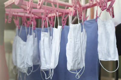 Close-up of clothes hanging on clothesline