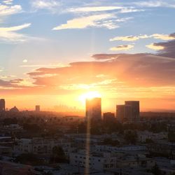 High angle view of city at sunset