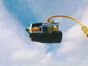 Low angle view of toy car against sky