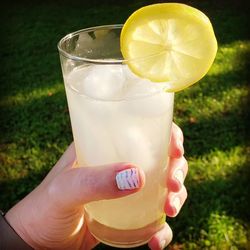 Close-up of hand holding drink