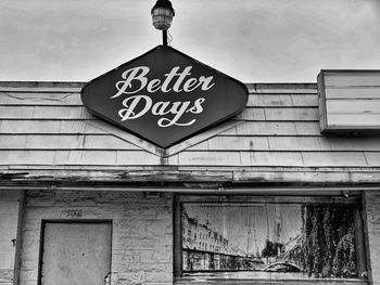 Low angle view of sign against building