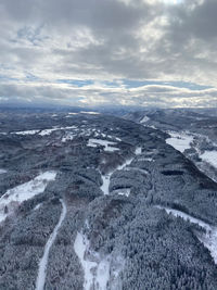 Aerial view of dramatic landscape against sky