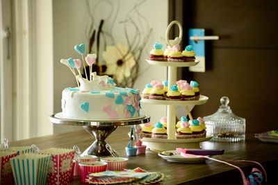 Desserts of birthday cake on table