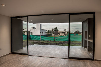 Buildings seen through glass window