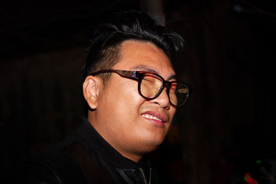 Portrait of young man wearing eyeglasses