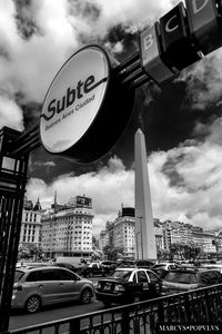 City street against cloudy sky