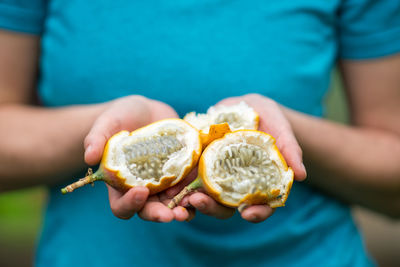 Close-up of hand holding ice cream