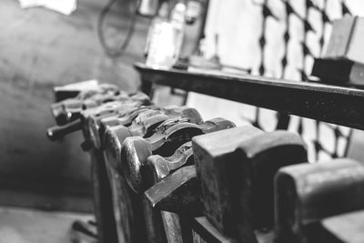 Close-up of hammers at blacksmith shop