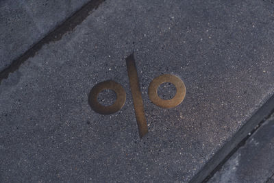 High angle view of manhole on road