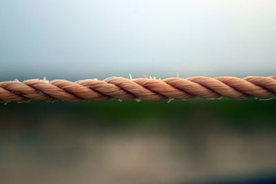 Close-up of rope against sky