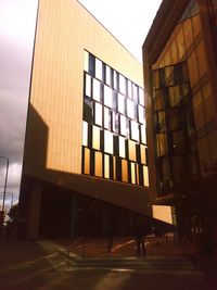 Low angle view of modern building against sky