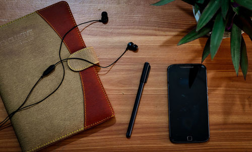 High angle view of mobile phone on table