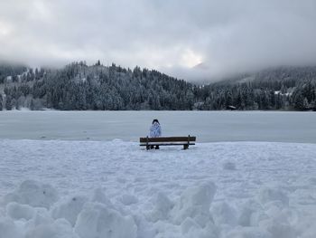 Sitting on a park bench at the spitzingsee