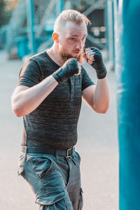 Young man looking at camera