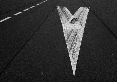 Close-up of car on road