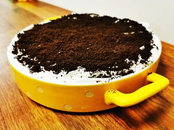 Close-up of coffee cup on table