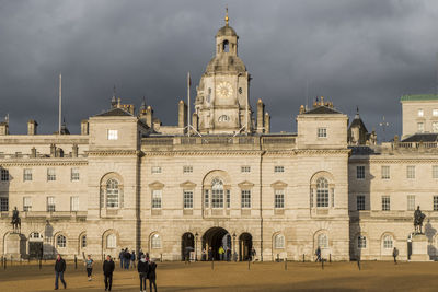 Group of people in front of building in london