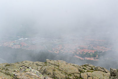 Rocky mountains on a foggy day at el escorial mountain in madrid in spain. horizontal photography