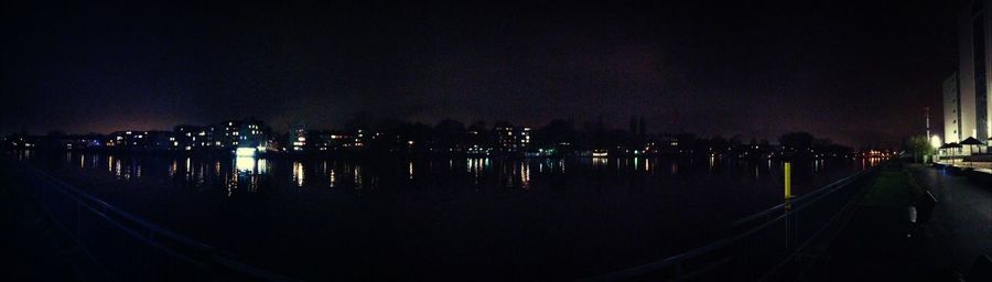 Reflection of illuminated buildings in water