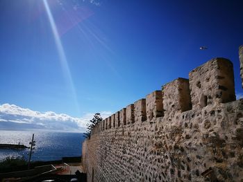 Low angle view of historical building against sky